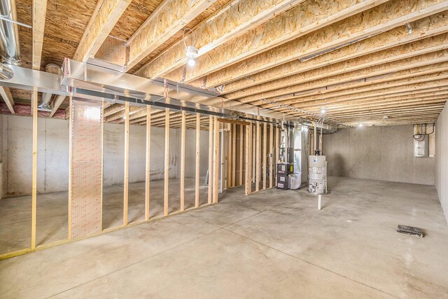 basement with heating unit and gas water heater