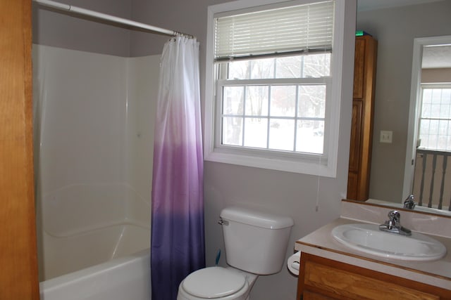 full bathroom with toilet, vanity, and shower / bath combination with curtain