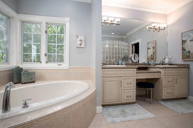 bathroom with tile patterned floors, crown molding, an inviting chandelier, vanity, and tiled bath