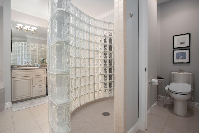 bathroom with vanity, tile patterned flooring, ornamental molding, and toilet