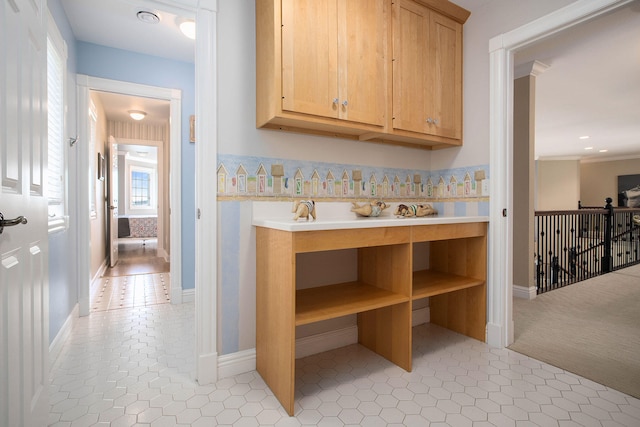 hallway featuring light tile patterned floors