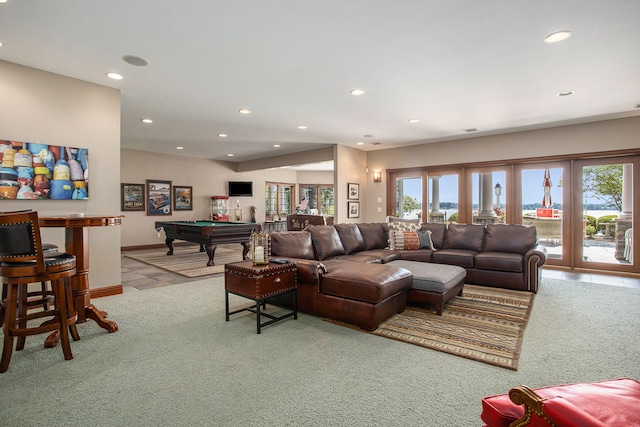 living room featuring light colored carpet and billiards