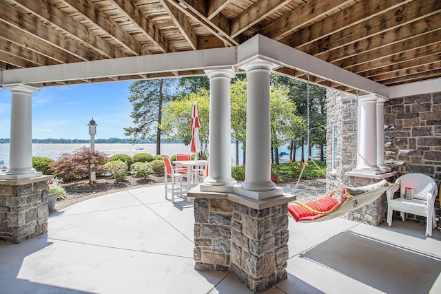 view of patio / terrace featuring a water view