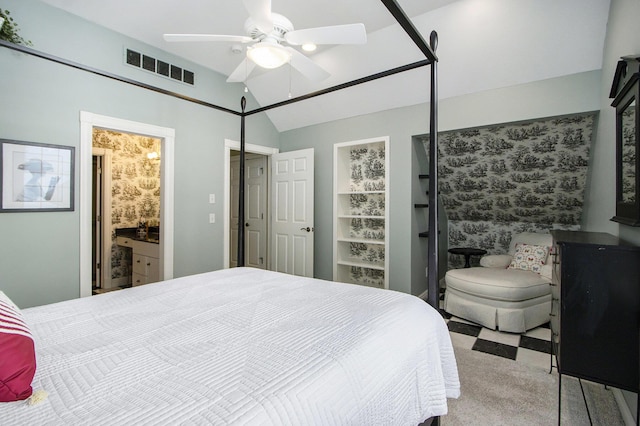 carpeted bedroom with lofted ceiling and ceiling fan