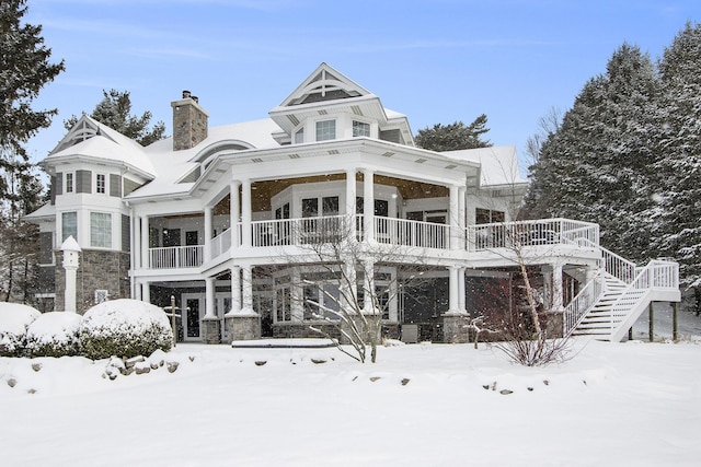 view of snow covered property