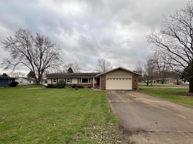 ranch-style house with a front yard and a garage