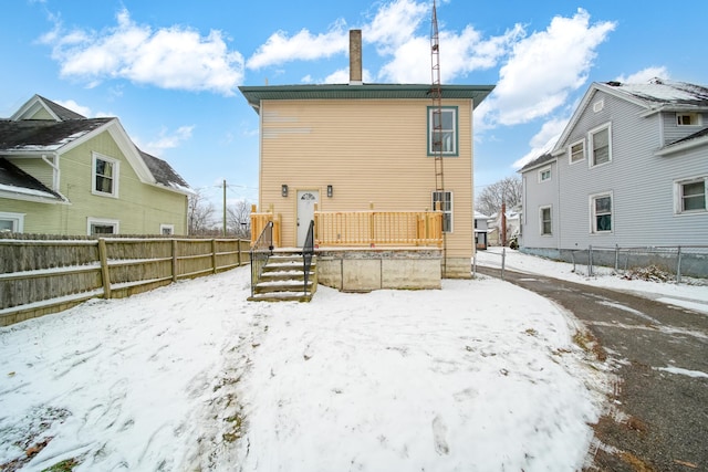 view of snow covered property