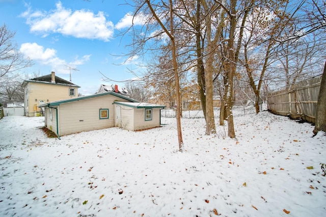 view of snow covered house