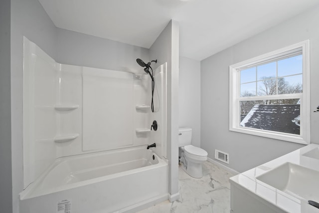 full bathroom featuring vanity, toilet, and washtub / shower combination