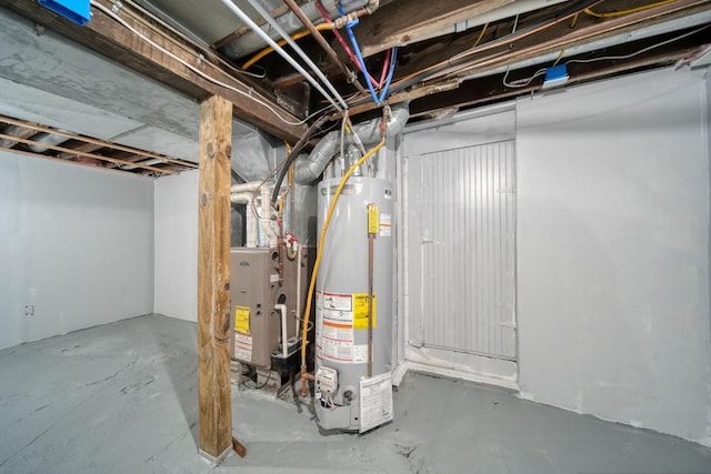 basement featuring heating unit and water heater