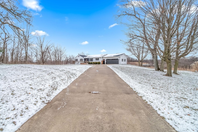 single story home featuring a garage