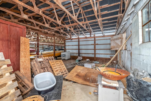 misc room with concrete flooring