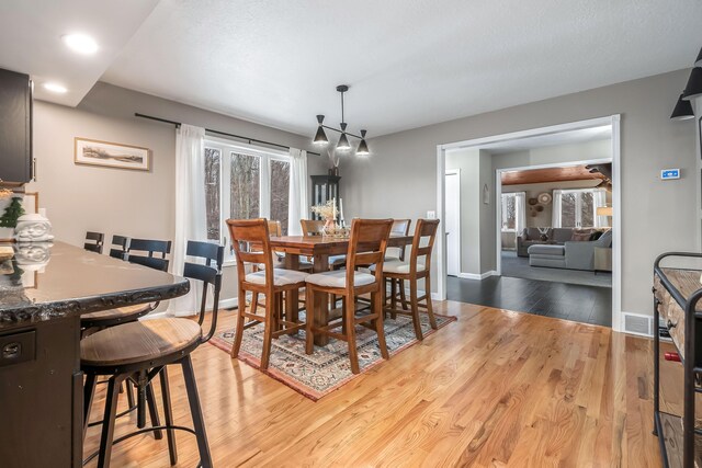 dining room featuring light hardwood / wood-style flooring