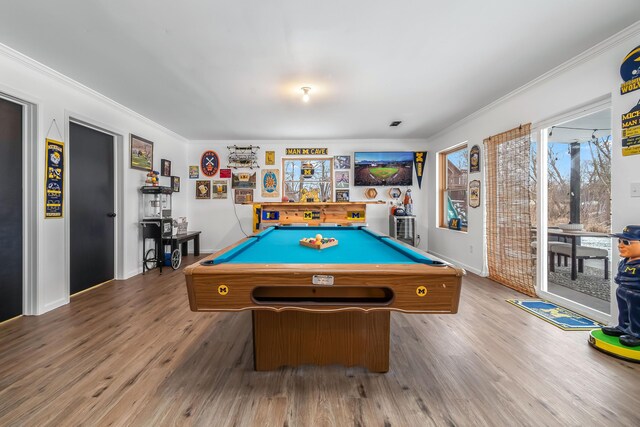 rec room featuring crown molding, hardwood / wood-style flooring, and billiards