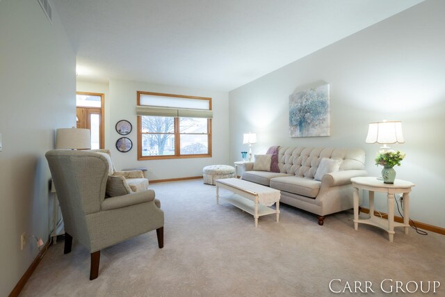 living room with light colored carpet