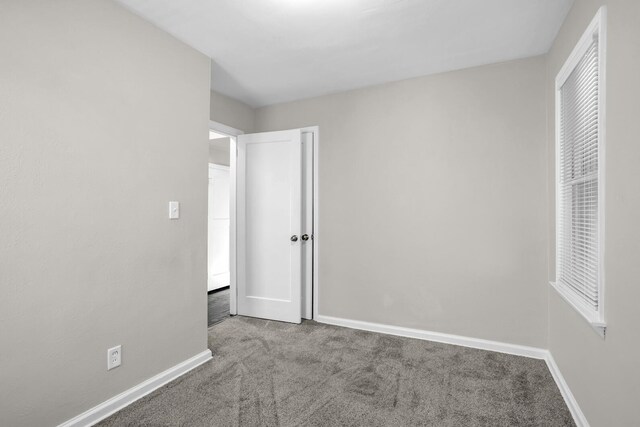 unfurnished bedroom with light carpet