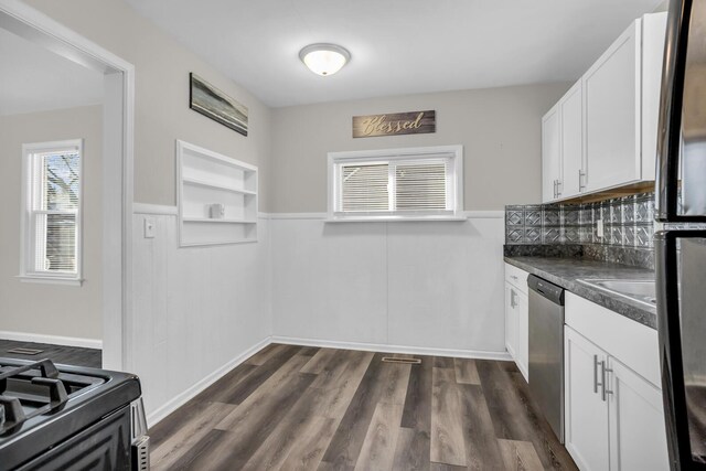 kitchen featuring built in shelves, dark wood-type flooring, sink, dishwasher, and white cabinetry