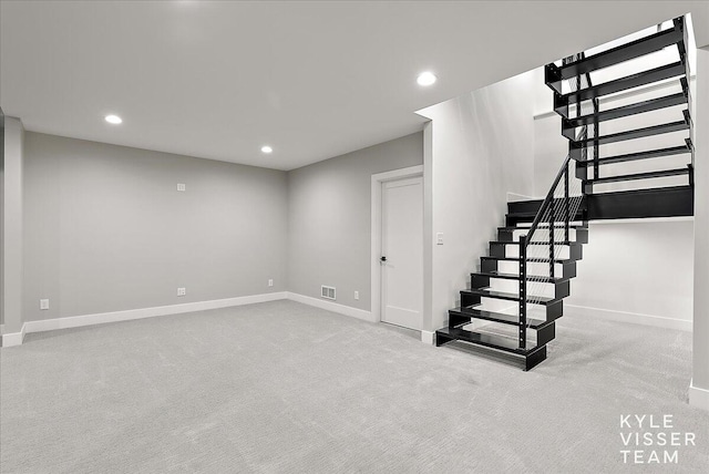 basement with light carpet