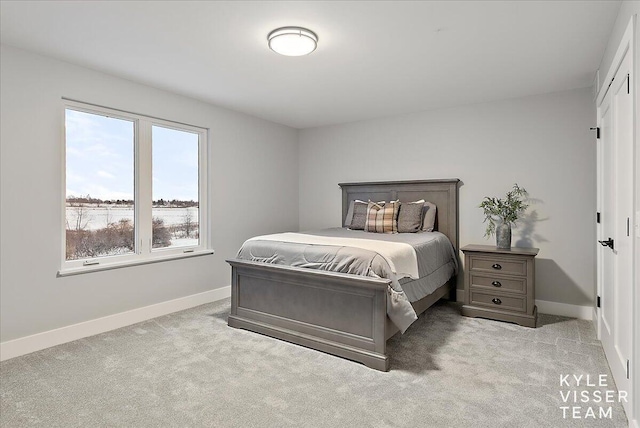 bedroom with light carpet