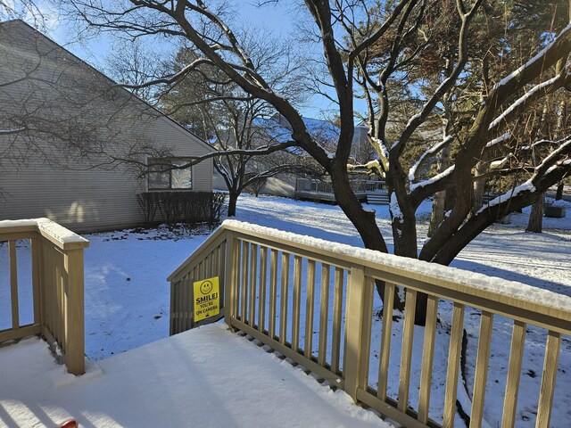 view of snow covered deck