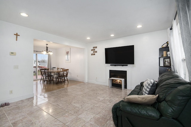 living room featuring an inviting chandelier