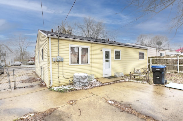 back of property featuring a patio area