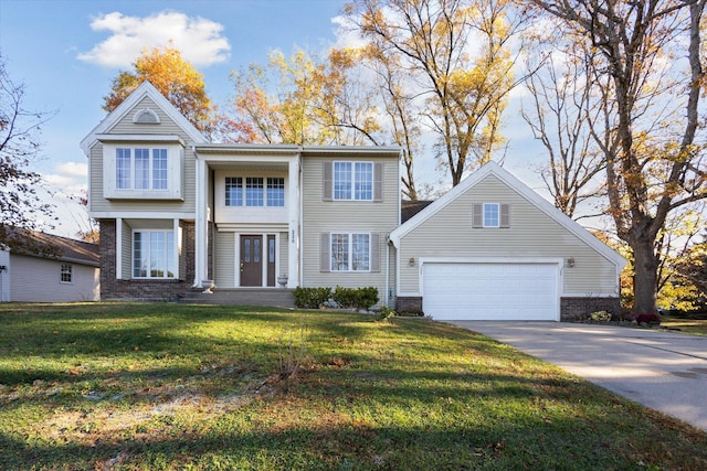 view of front of property featuring a front lawn and a garage