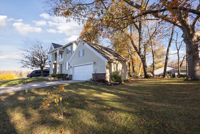 view of side of home with a garage and a lawn