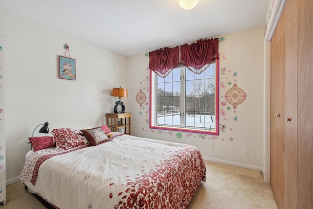 carpeted bedroom with a closet