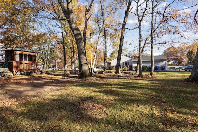 view of yard with a wooden deck