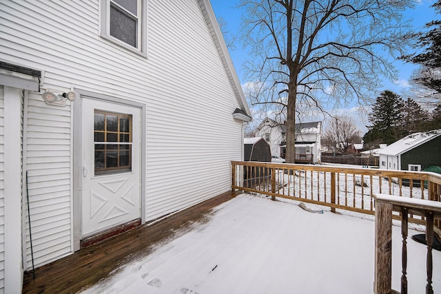 view of snow covered deck