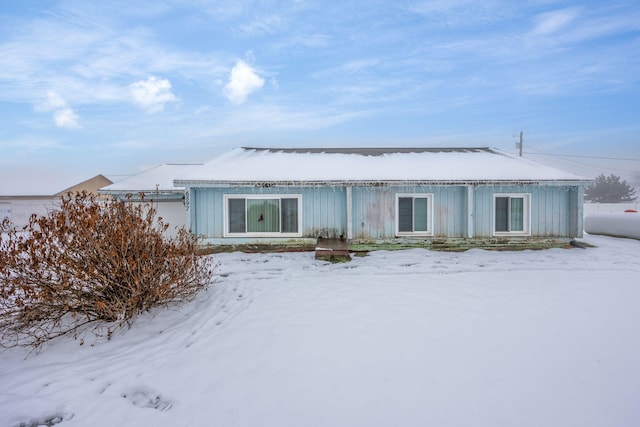 view of snow covered property