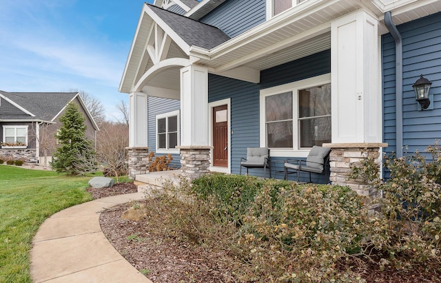 property entrance featuring covered porch