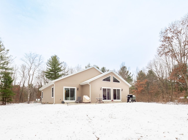 view of snow covered house