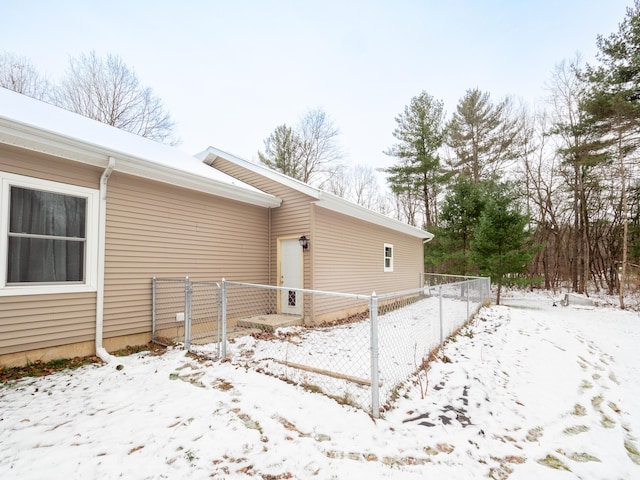 view of snow covered property