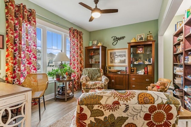 interior space with hardwood / wood-style flooring and ceiling fan