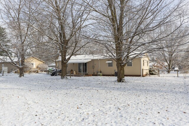 view of snow covered property