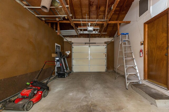 garage featuring a garage door opener