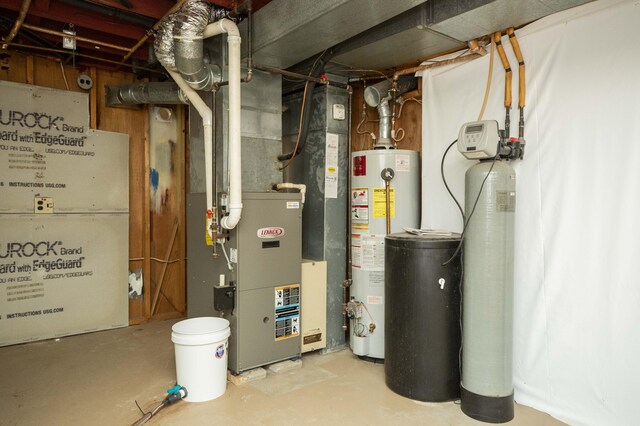 utility room with gas water heater and heating unit