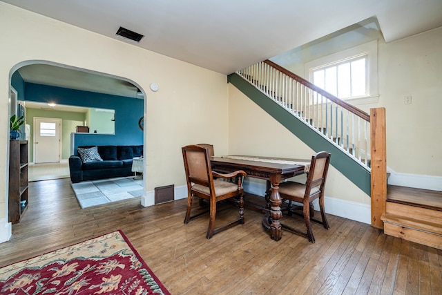 dining area with hardwood / wood-style floors and plenty of natural light