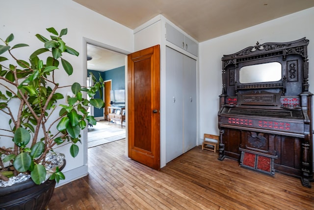 miscellaneous room with hardwood / wood-style floors