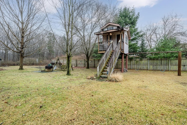 view of playground with a yard