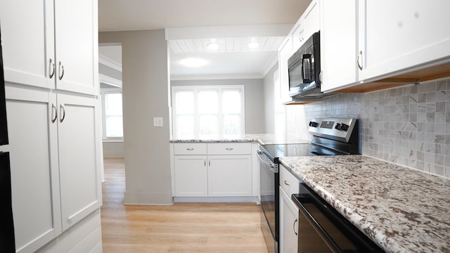 kitchen featuring white cabinetry, ornamental molding, stainless steel electric range, and backsplash