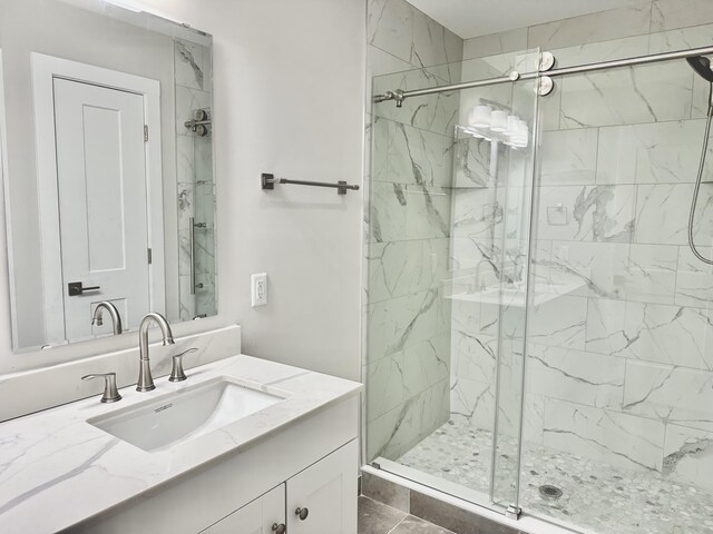 bathroom featuring vanity and walk in shower