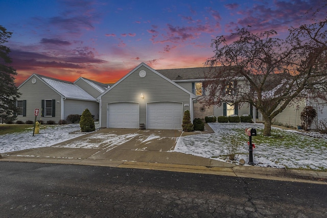 view of front of property with a garage