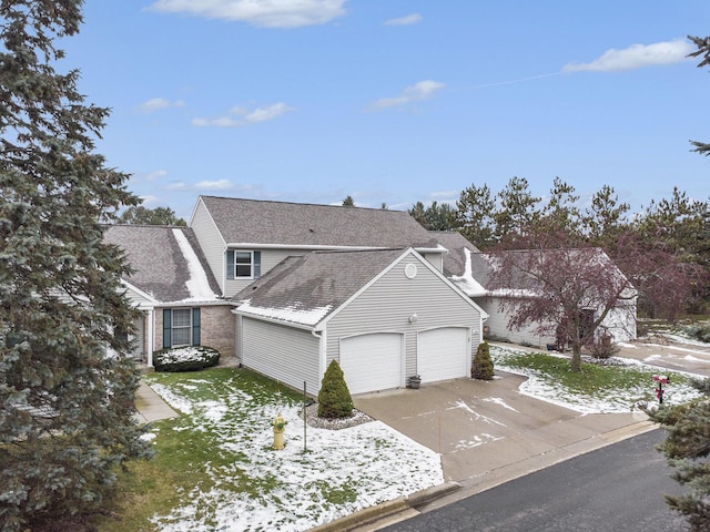 front of property with a garage