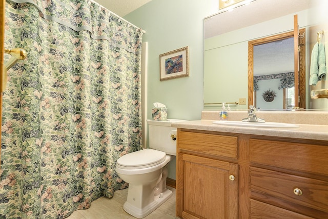 bathroom featuring walk in shower, tile patterned floors, a textured ceiling, toilet, and vanity