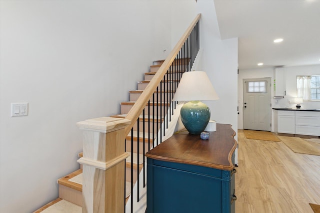 10606 Lake St, Chippewa Lake, MI 49320 - stairway featuring wood finished floors and recessed lighting