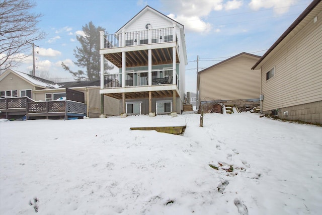 view of snow covered house