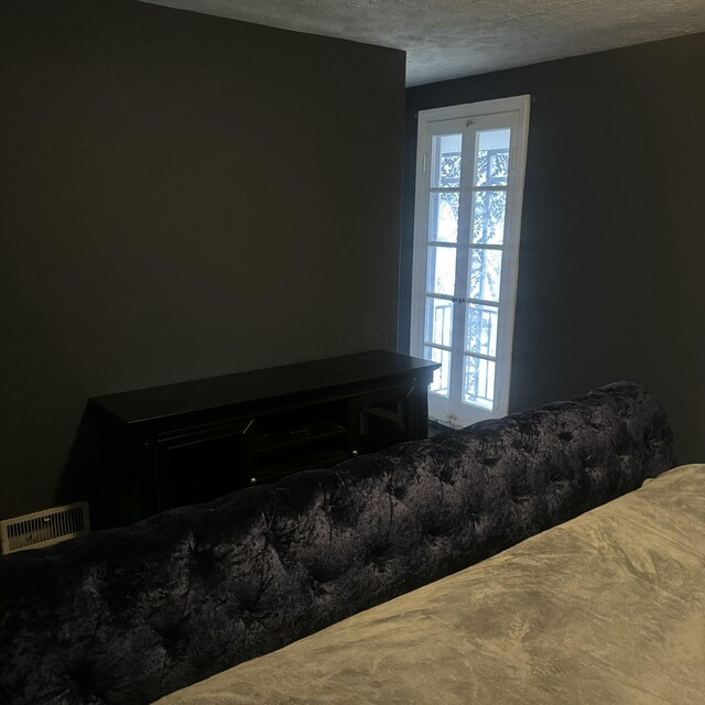 bedroom with a textured ceiling